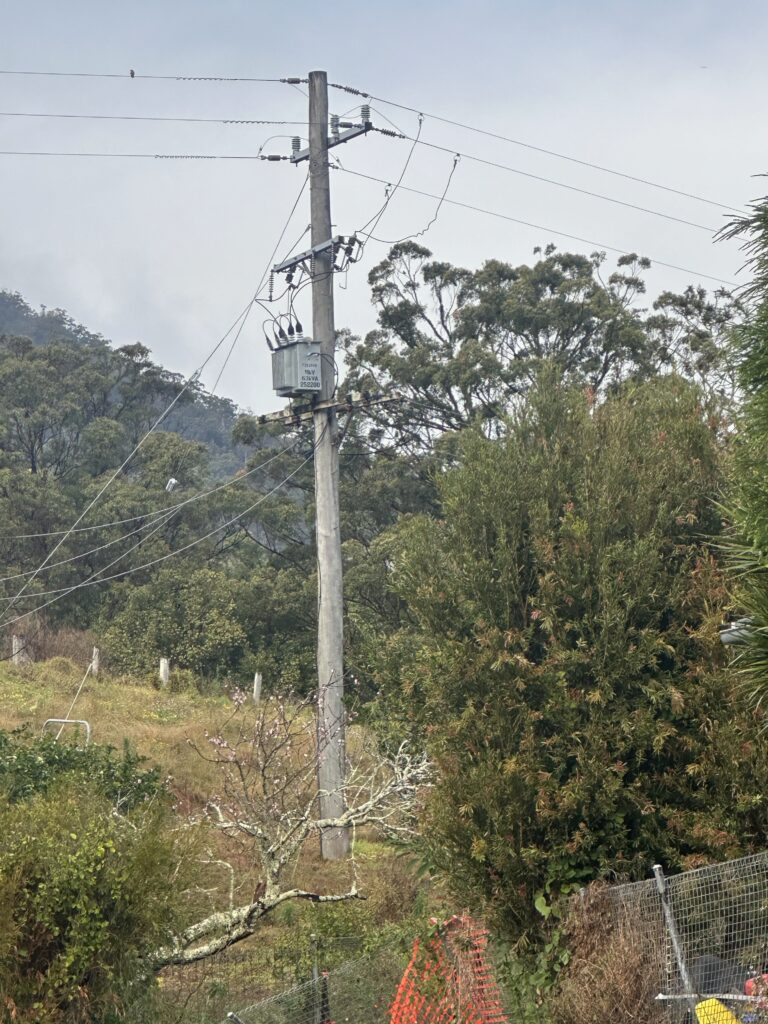 Level 2 electrician installing a private power pole in Northern NSW
